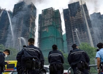 At Least 65 Dead and Hundreds Missing in Hong Kong Fire; Police Confirm Arrests