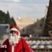 Bethlehem's Christmas Tree Illuminated Amid Ongoing Gaza Conflict