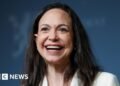 María Corina Machado Warns: Exiting Venezuela Poses Significant Risks
