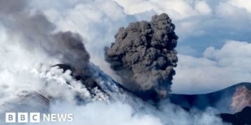 Mount Etna Erupts While Skiers Enjoy Winter Sports on Nearby Slopes