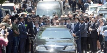 Mourners Gather for Funeral of Rabbi Eli Schlanger, Victim of Bondi Attack