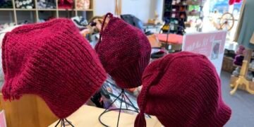 Red Hat Symbolises Subtle Protest Across Minnesota Communities