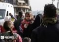 Thousands Displaced as Syrian Government and Kurdish Fighters Clash