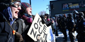 Immigrant Groups and 'White Savior' Activists Engage in Heated Dispute