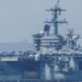 US Aircraft Carrier Deploys Fighter Jet to Intercept Iranian Drone Amid Rising Tensions