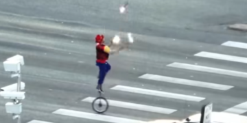Unicyclist Juggles Fire on Crossing, Raising Safety Concerns in Community